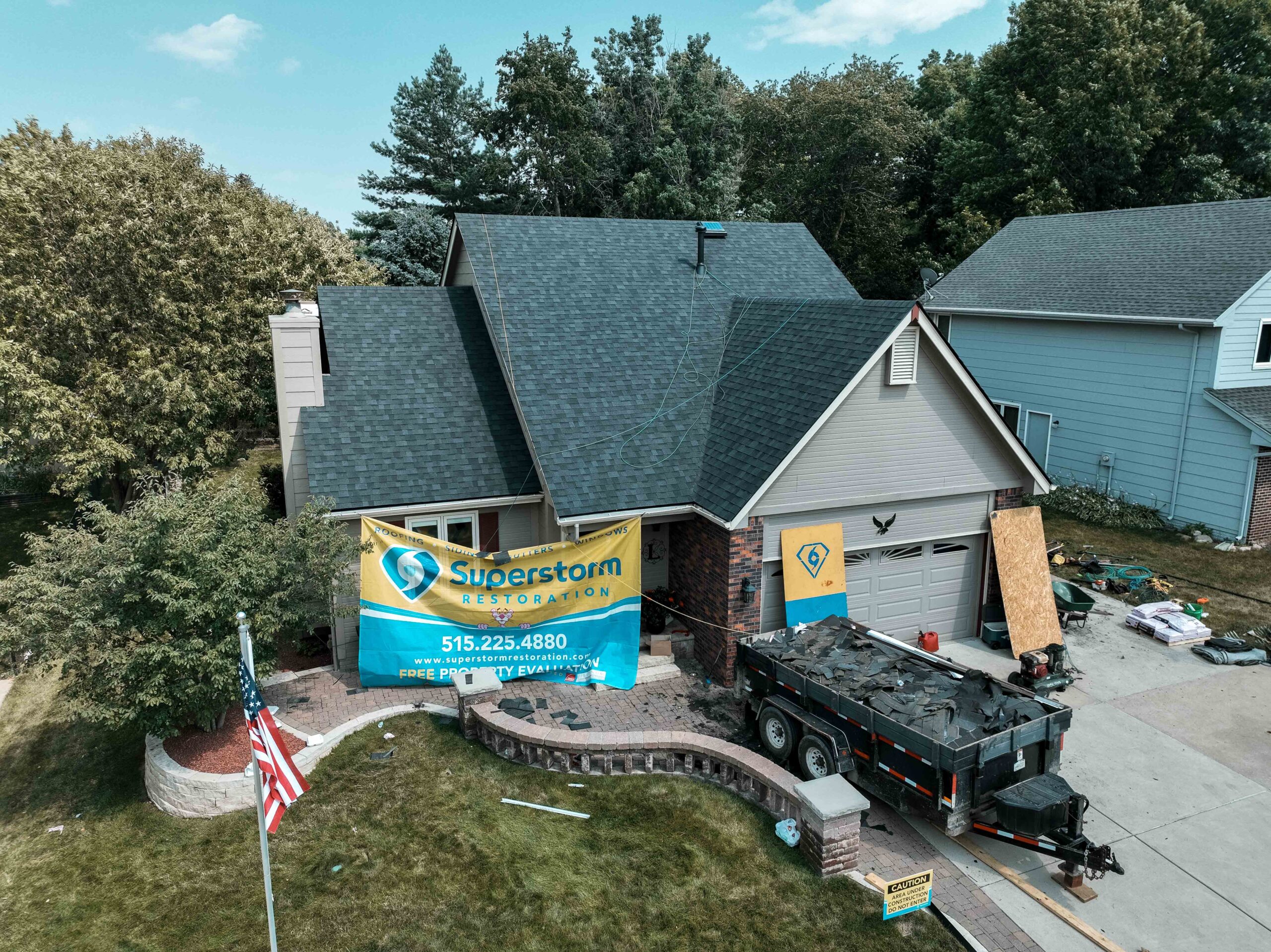 Aerial drone photo of a completed roof replacement by Superstorm Roofing and Siding in Central Iowa