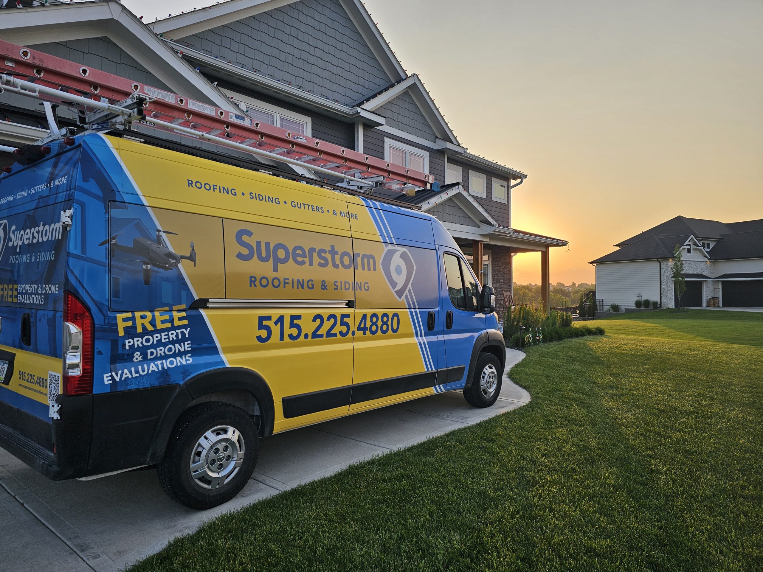 Superstorm Roofing crew completing a roof installation in Des Moines Iowa
