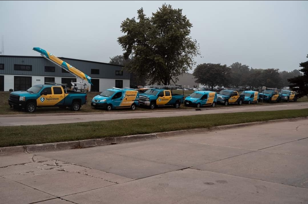Superstorm Roofing and Siding fleet of trucks and equipment at Waukee Iowa office