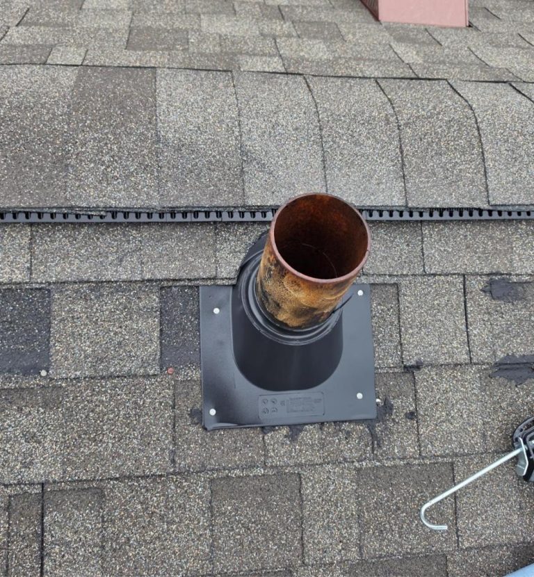 Replacement pipe boot installed during a roof repair